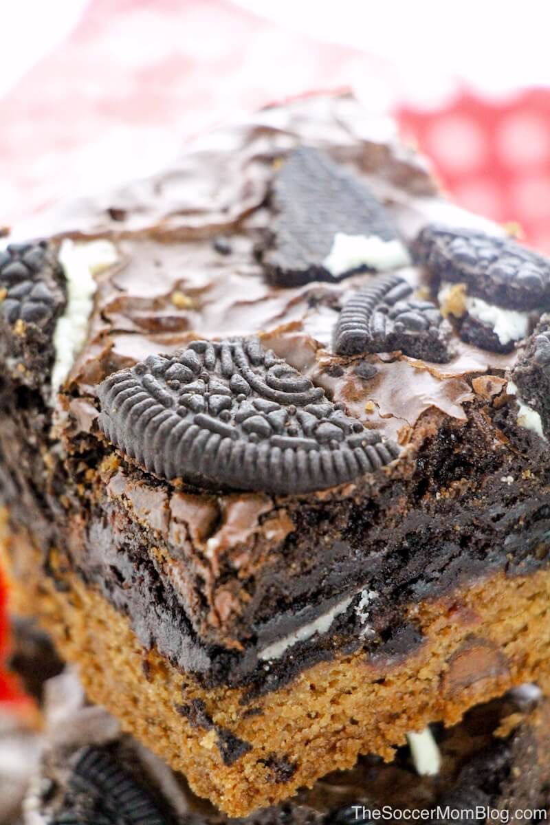 The most decadent dessert recipe ever...guaranteed!! Slutty brownies combine the best desserts of all time: chocolate chip cookies, OREOs, brownies into one big batch of amazingness!!