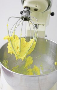 stand mixer with lime cake batter