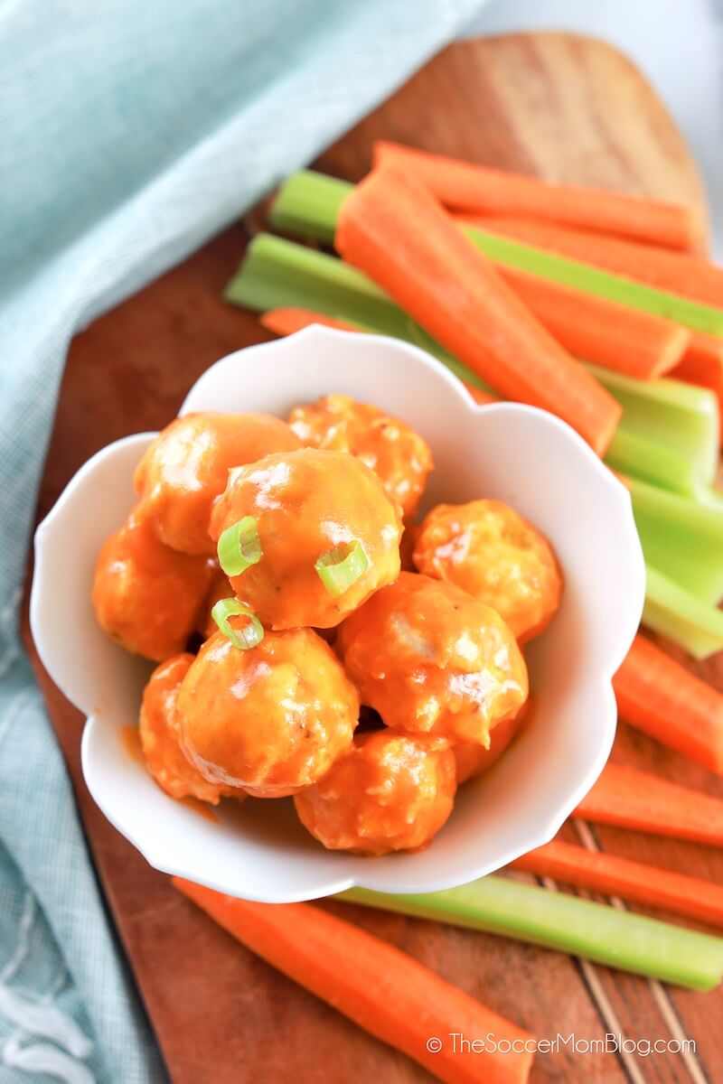 keto buffalo chicken meatballs with celery and carrot sticks