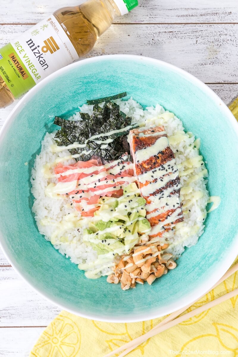 top down view of a rice bowl topped with salmon and wasabi mayo