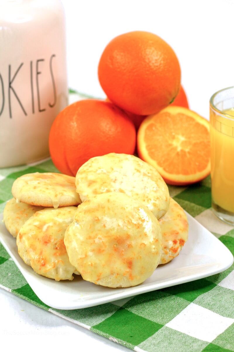 orange cookies with oranges and orange juice