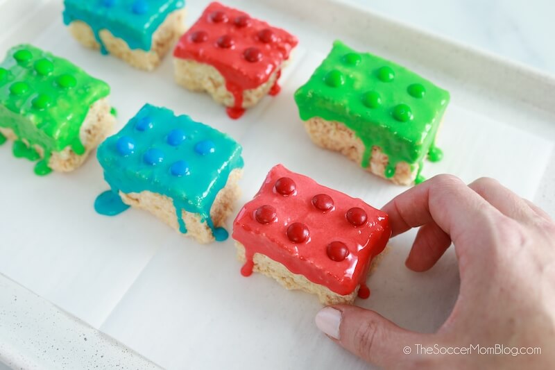 picking up a LEGO Rice Krispies Treat
