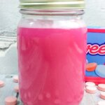 pink sweet tart candy moonshine in mason jar