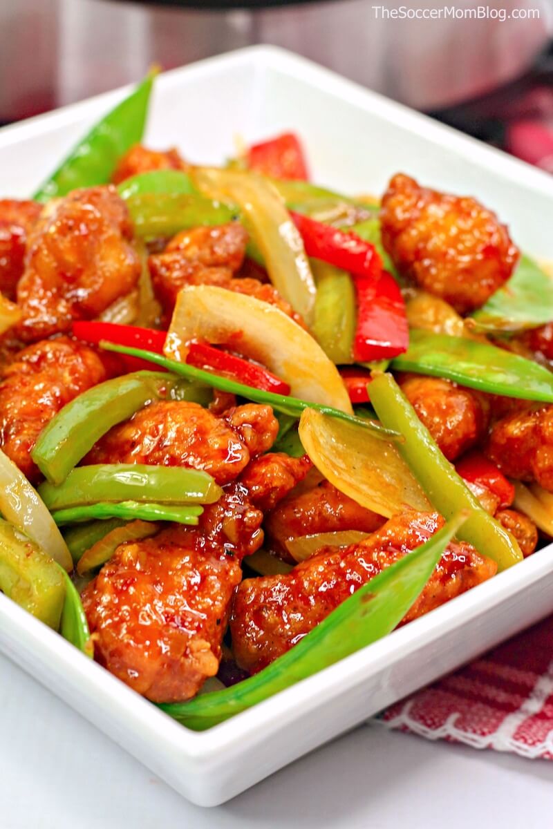 Crispy Firecracker Chicken with peppers and snow peas