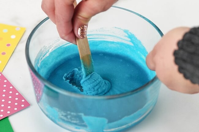 stirring blue playdoh