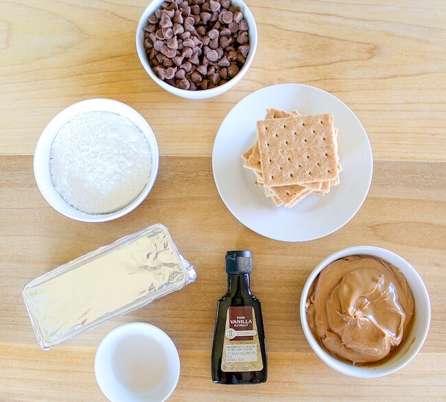 chocolate chips, peanut butter, graham crackers on cutting board