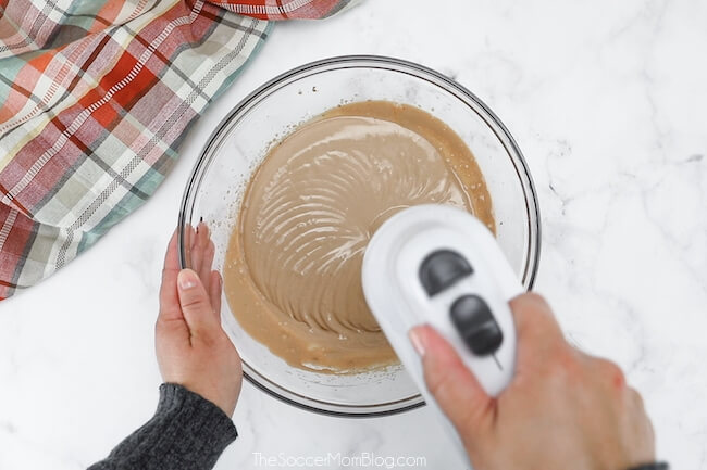 mixing chocolate cloud bread batter with electric mixer