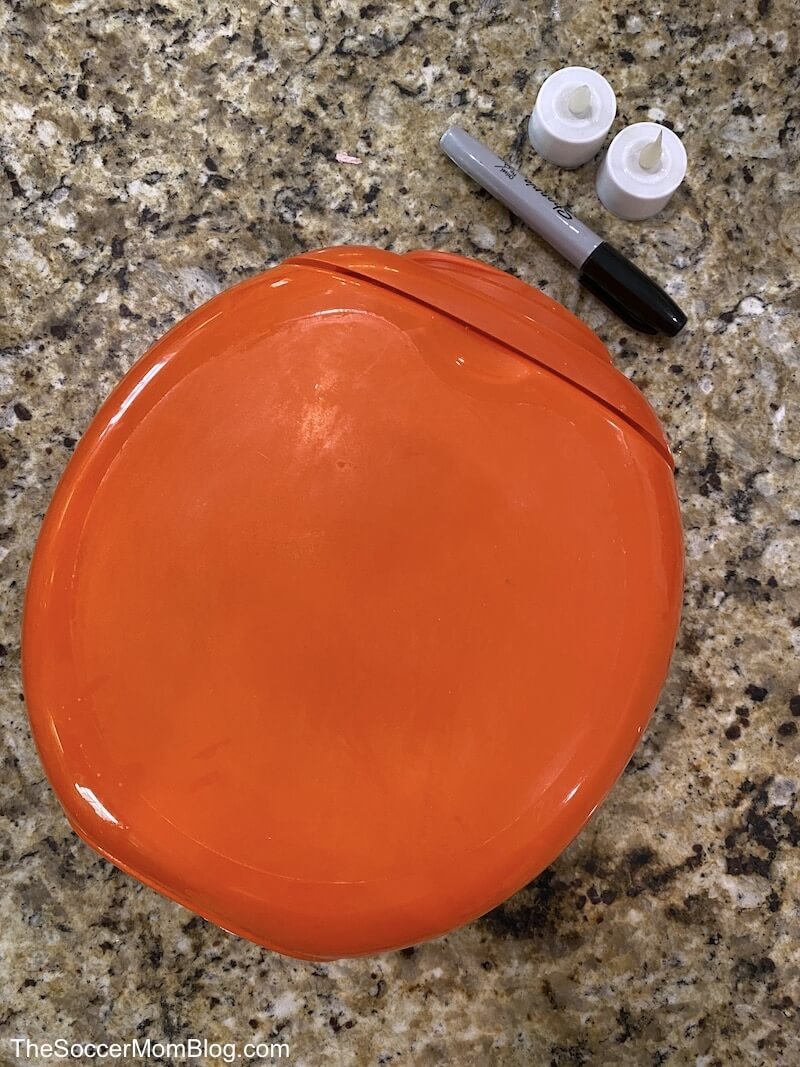 supplies needed to make a laundry container jack-o-lantern