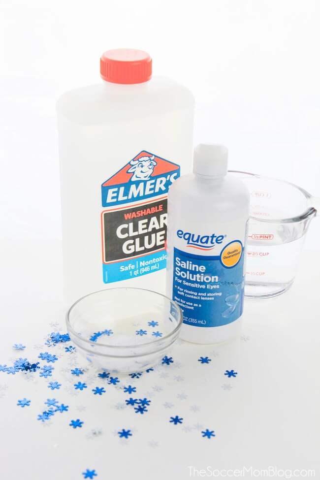 winter slime ingredients: clear glue, baking soda, contact solution, glitter