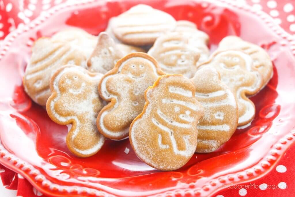 frosted gingerbread cookies on red plate