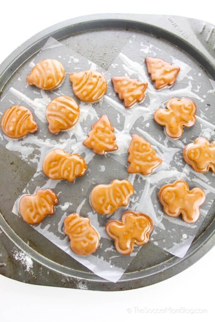 glazed gingerbread cookies on baking sheet