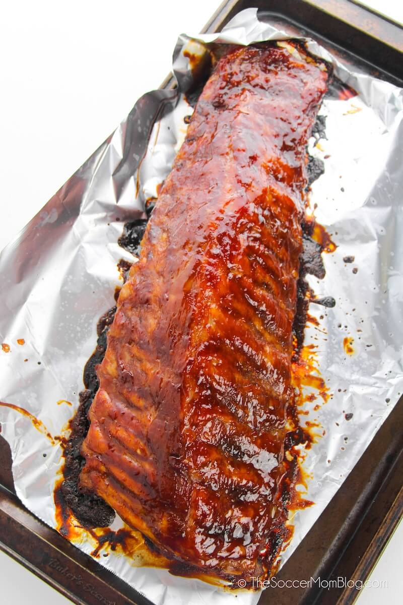 rack of bbq spare ribs on baking sheet