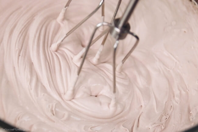 making chocolate whipped cream with electric mixer