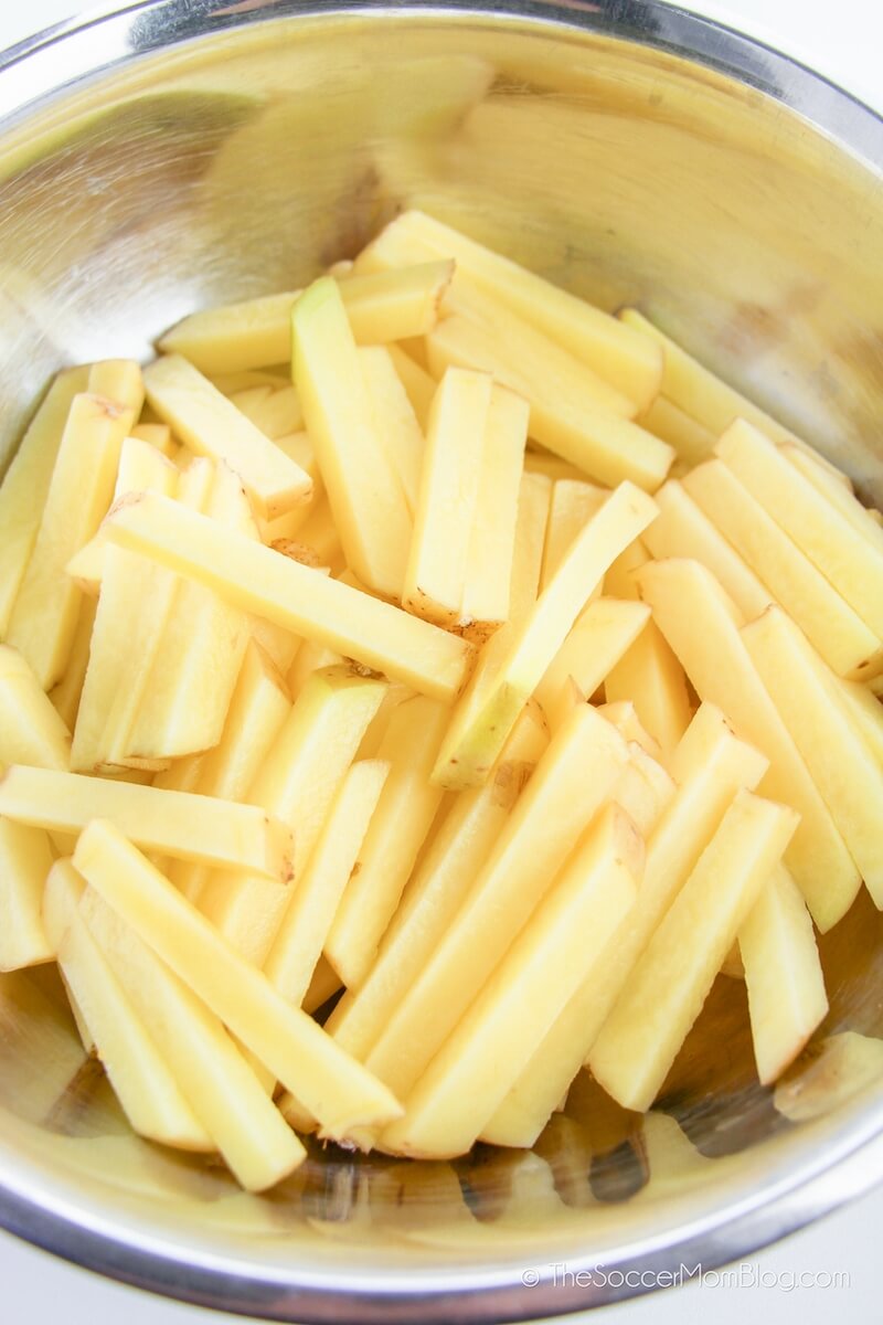 French Fry cut potatoes in mixing bowl