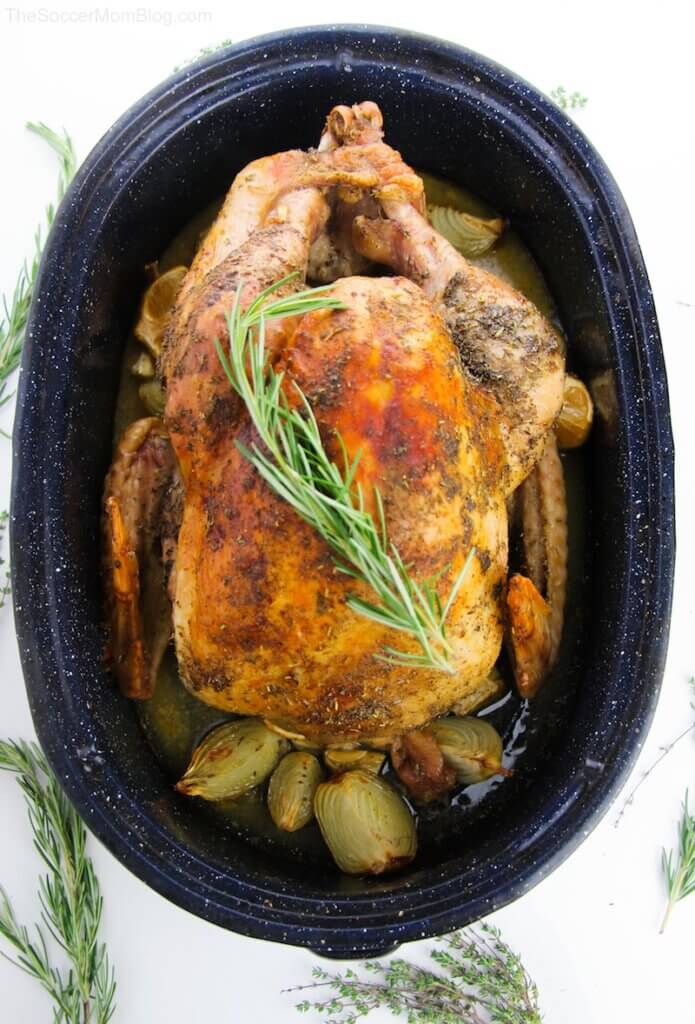 golden brown roast turkey in roasting pan
