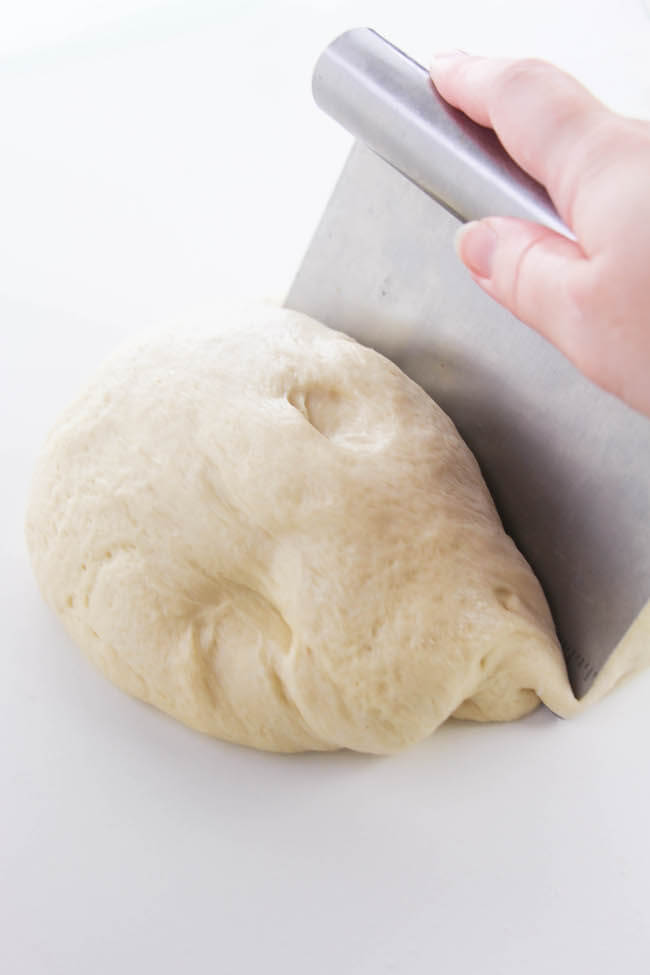 cutting bread dough