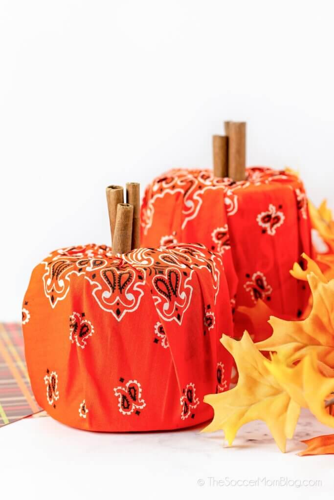 decorative pumpkins made from toilet paper rolls and bandanas
