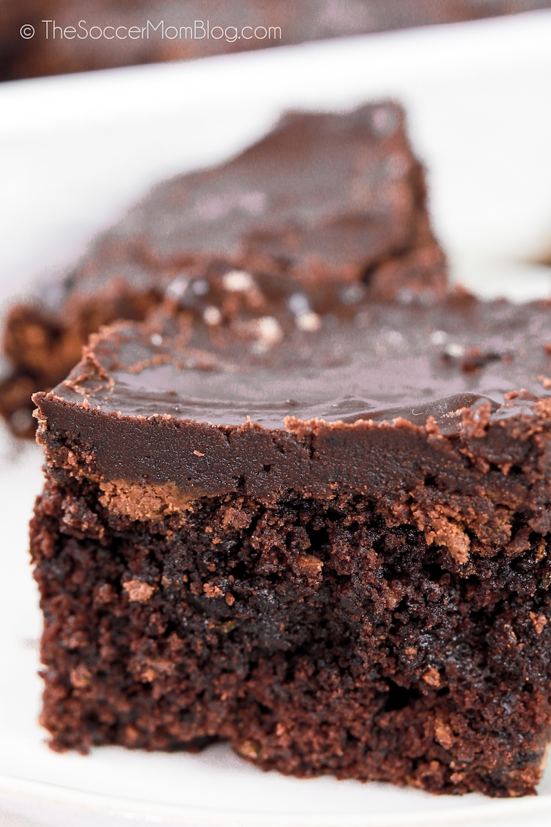 close up of a fudge brownie made with zucchini and chocolate frosting