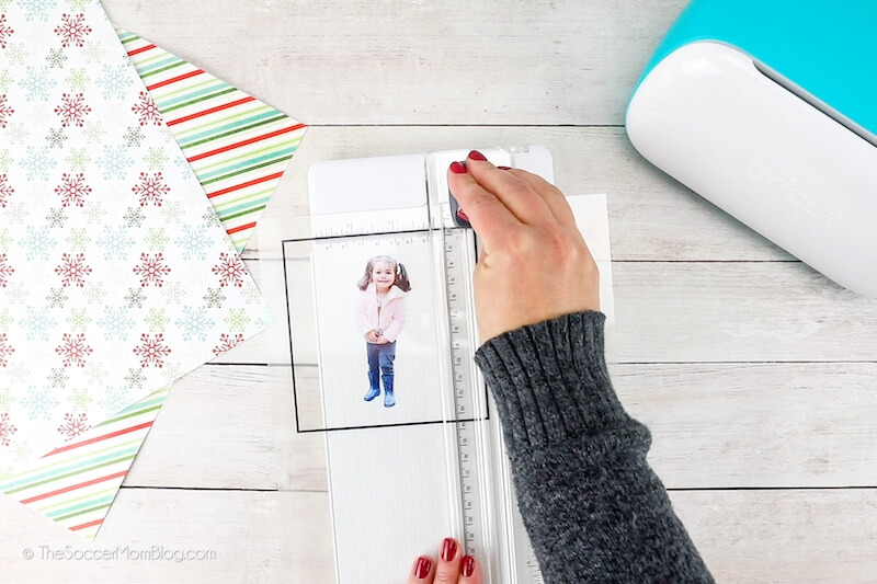 cutting out child's photo with paper cutter