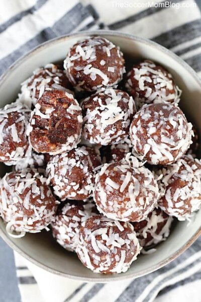homemade chocolate protein balls covered in shredded coconut