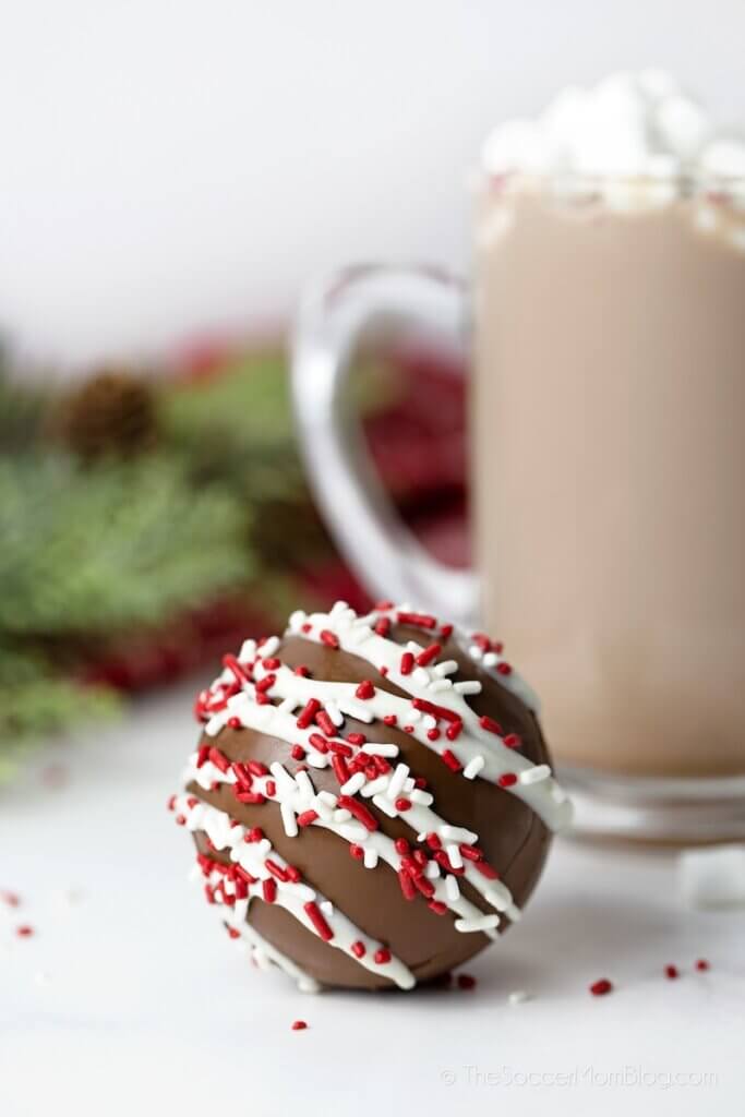 hot chocolate bomb and mug of hot cocoa
