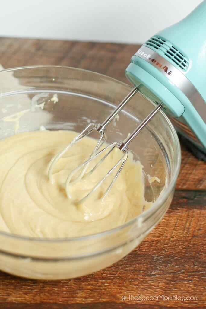 quick bread batter in mixing bowl with electric mixer