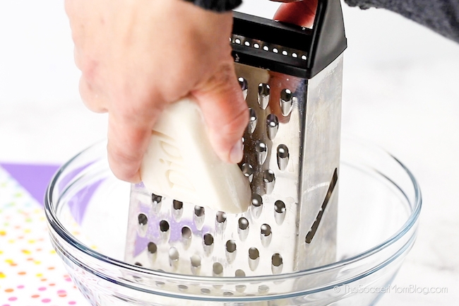 shredded soap with a cheese grater