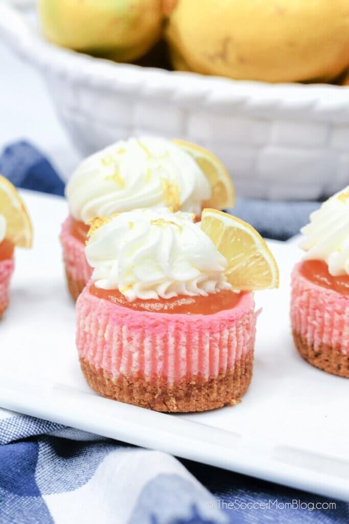 pink lemonade mini cheesecakes and bowl of lemons