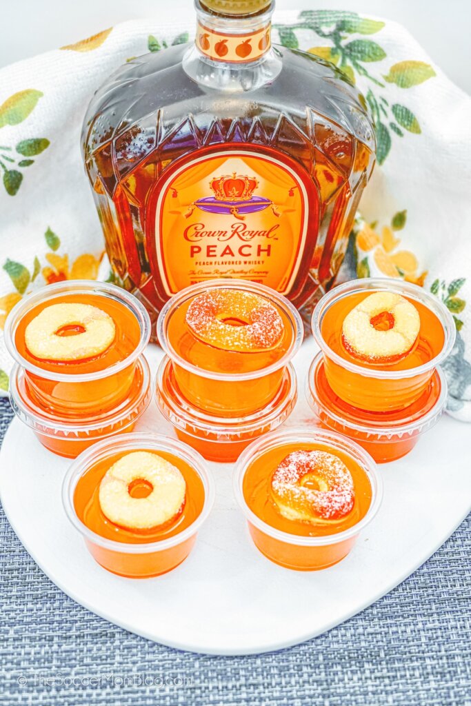 peach flavored Jello shots with gummy candy and Crown Royal