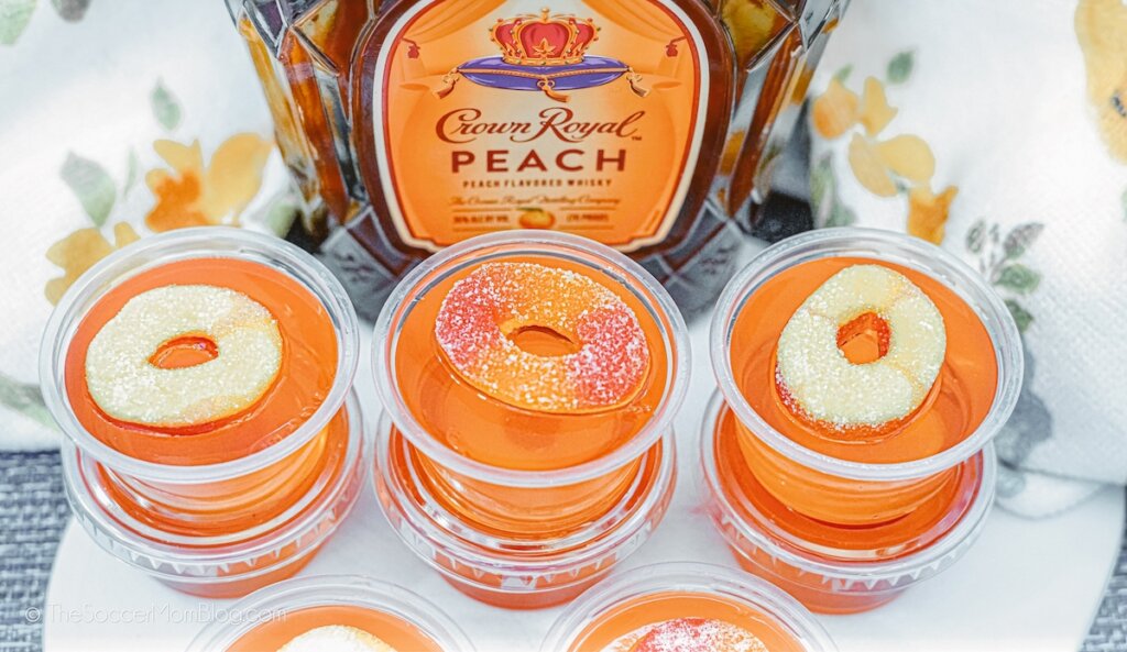 peach jello shots with gummy candy on top