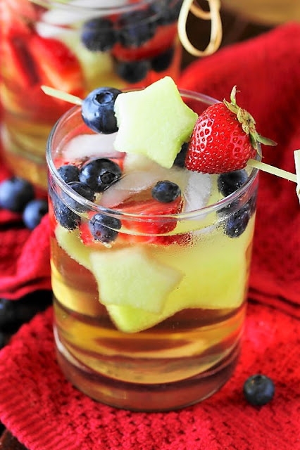 4th of July mocktail for kids with fruit shaped like stars