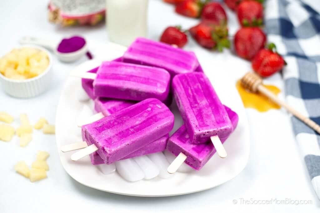 Pile of dragon fruit popsicles on a plate