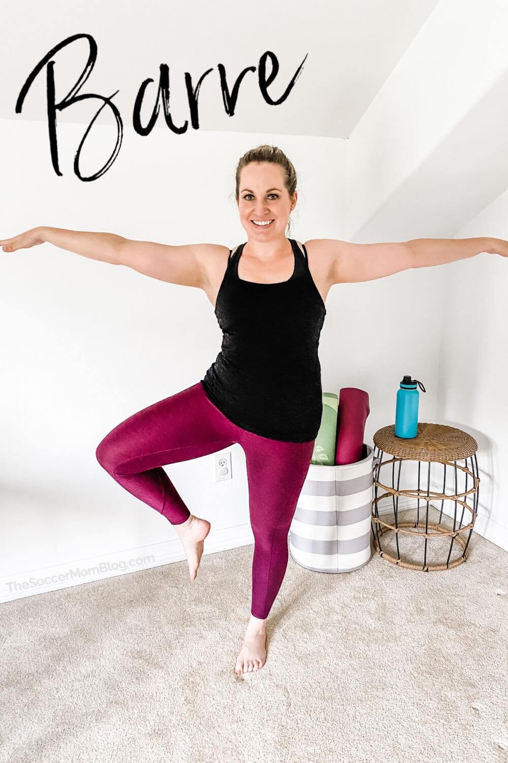 woman practicing barre class at home