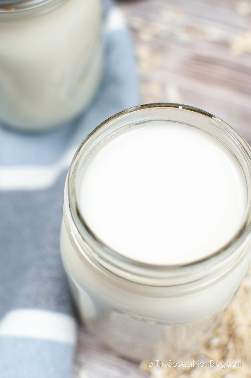 creamy homemade oat milk in mason jar