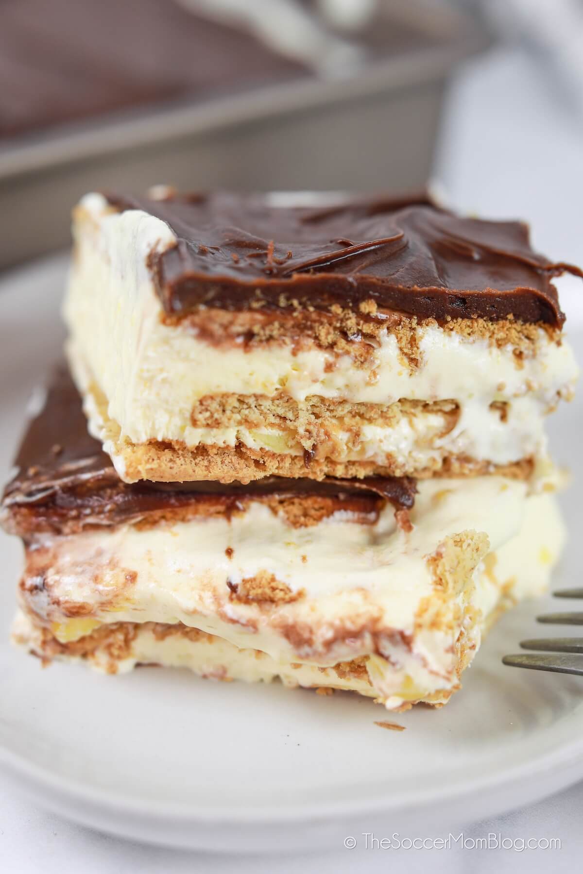 sliced eclair cake made with graham crackers and pudding