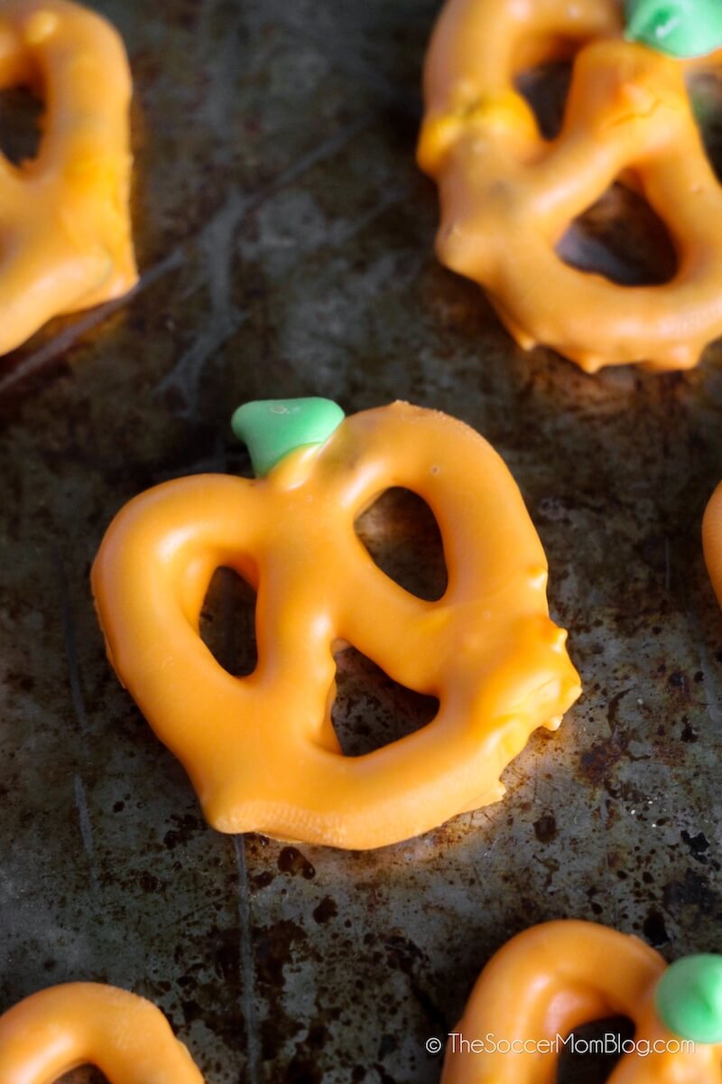 pretzel dipped in chocolate to look like a pumpkin