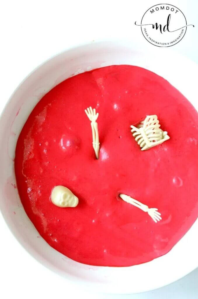 red slime with toy skeleton