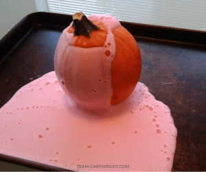 pumpkin with foam coming out the top