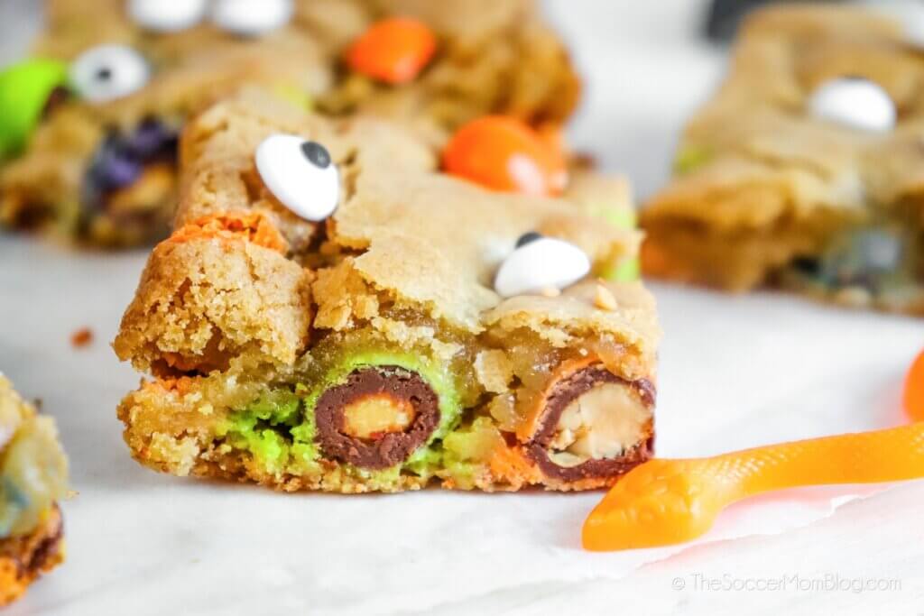 Close up photo of a Halloween cookie bar filled with candy