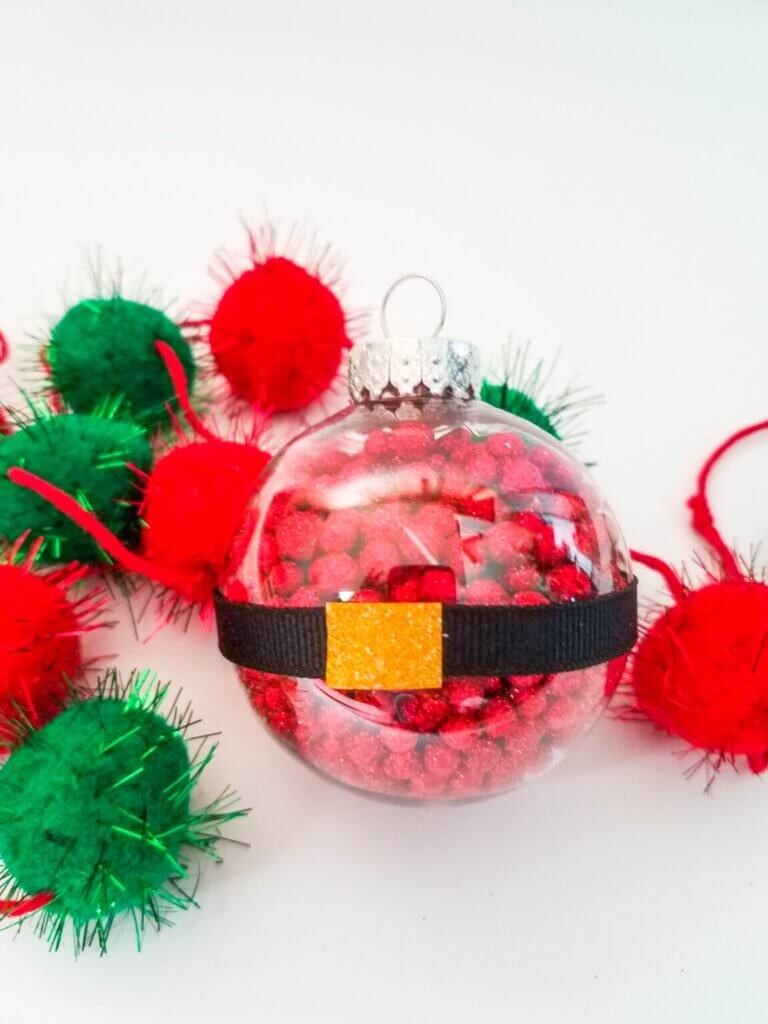 santa ornaments filled with red pom poms
