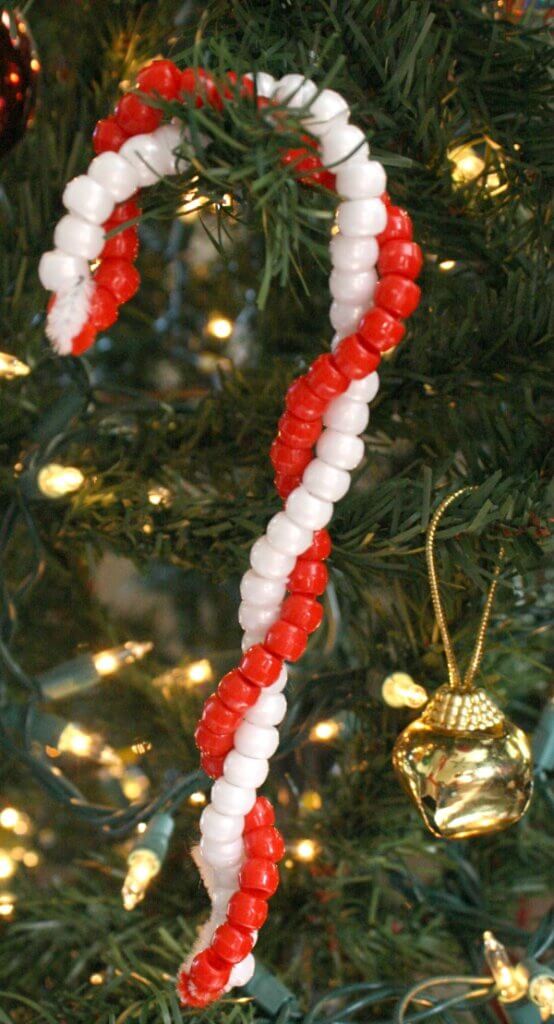 candy cane ornament made with twisted strands of red and white beads