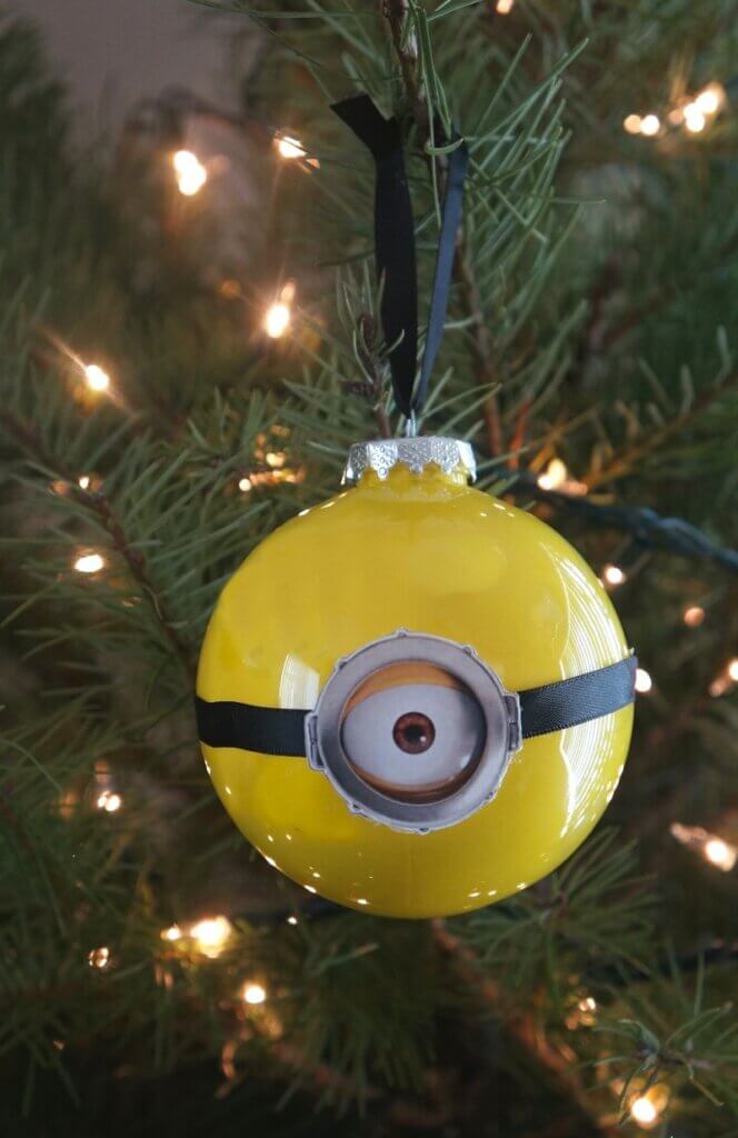 round yellow ornament with Minion eye on front