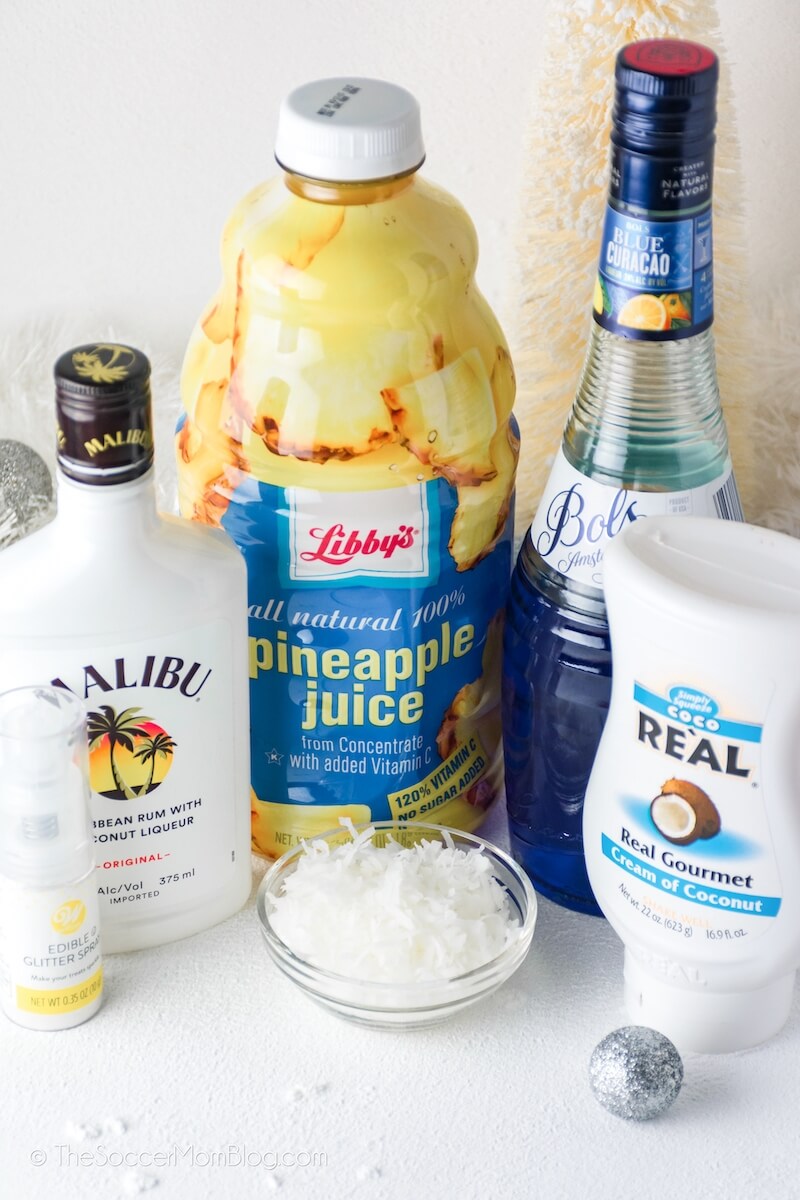 pineapple juice, Malibu, coconut cream, and blue curaçao on counter