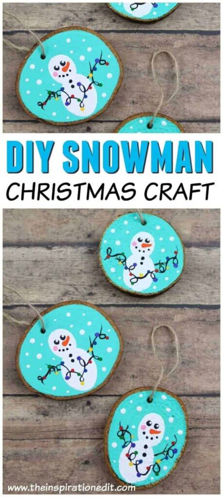 blue painted wood slice ornaments with snowmen
