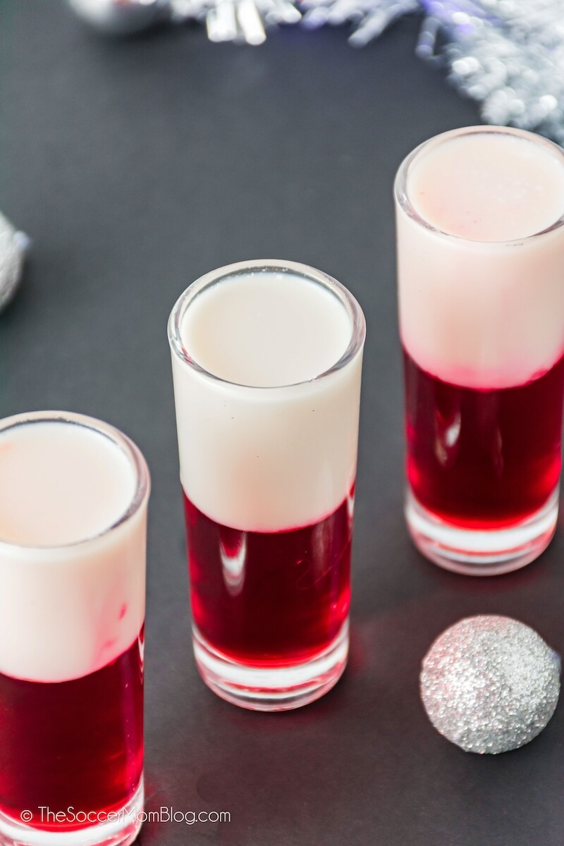 red and white layered shooters in tall shot glasses