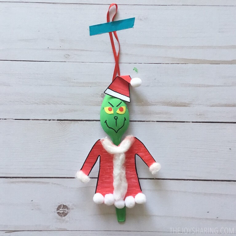 Grinch ornament made with painted spoon