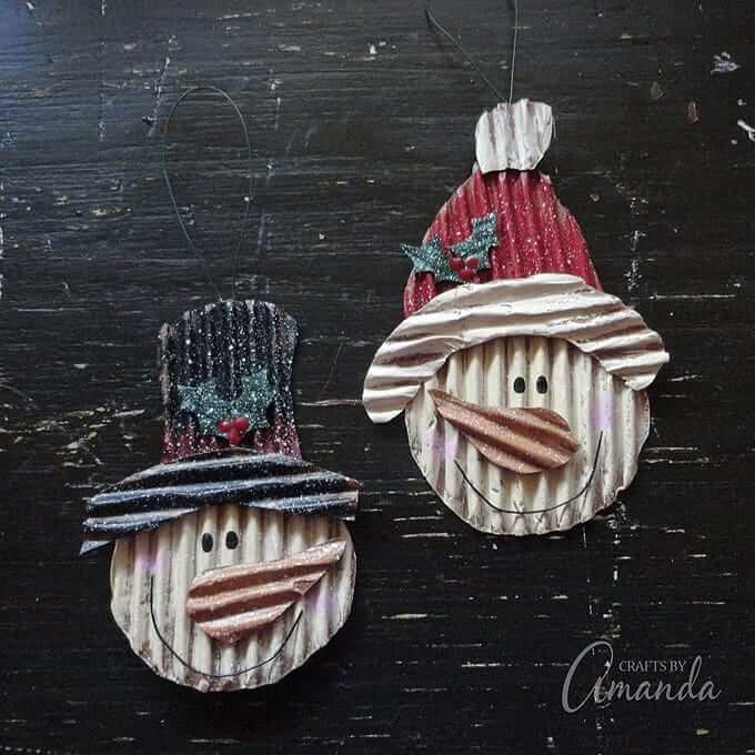 snowmen ornaments made with painted corrugated cardboard