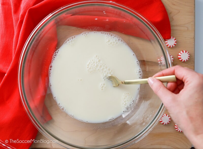 mixing white gelatin in glass bowl