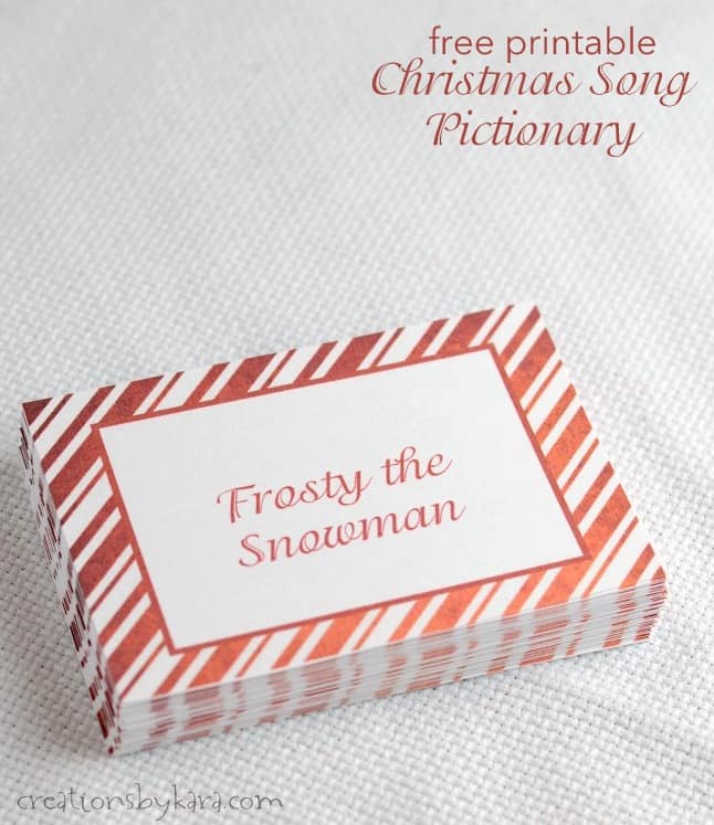 stack of cards with Christmas songs printed on them