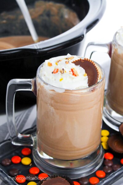 mug of peanut butter hot chocolate with whipped cream on top